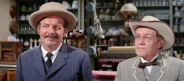 Gordon Jones as Matt Douglas and Strother Martin as Agard, an Indian agent out to cheat them in McLintock! (1963)