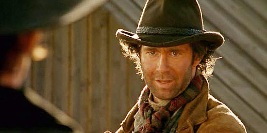 Grant Piro as Woodrow Wharton, one of cattleman Fergus Hunter's men in The Outsider (2002)