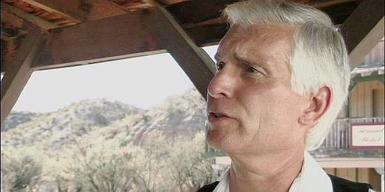 Gregory Sweet as Ron Watson, informing Earl of his decision to have his daughter take over the bank in The Decoy (2006)