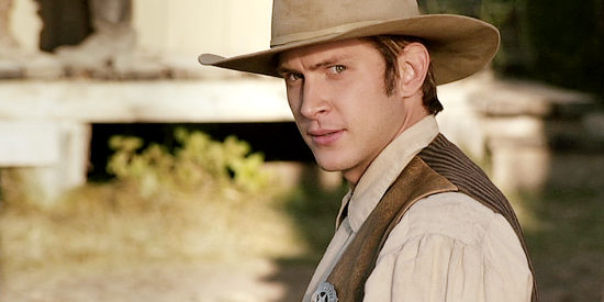Greyson Holt as Wyatt Earp, the deputy who has taken a shine to a bounty hunter named Hannah in Hannah's Law (2012)