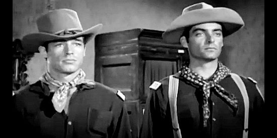 Guy Madison as Larry Knight and Rory Calhoun as Phil Acton, awaiting orders in Massacre River (1949)