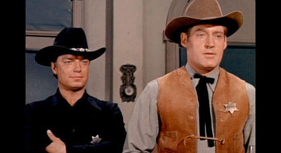 Guy Mitchell as Johnny Silver and Marshall Reed as Sheriff Henry Plummer, the men behind the gold robberies in The Wild Westerners (1962)