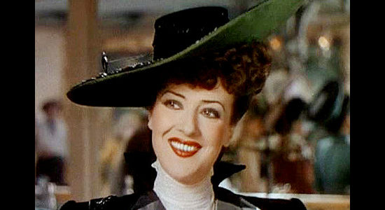 Gypsy Rose Lee as Belle De Valle, hoping 'Honest' John Calhoun has turned honest for good in Belle of the Yukon (1944)