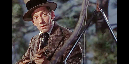 Hoagy Carmichael as Hi Linnet, the traveling minstrel who knows Camrose's secret in Canyon Passage (1946)