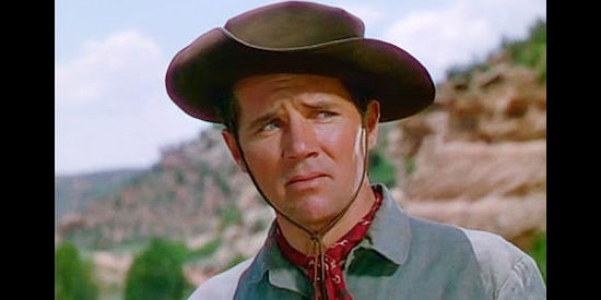 Howard Duff as Lin Sloane, a man determined to catch a prized wild stallion in Red Canyon (1949)