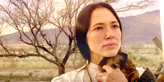 Irene Bedard as Sunny Red Eagle, wife of Johnny and mother of Samuel in Miracle at Sage Creek (2005)