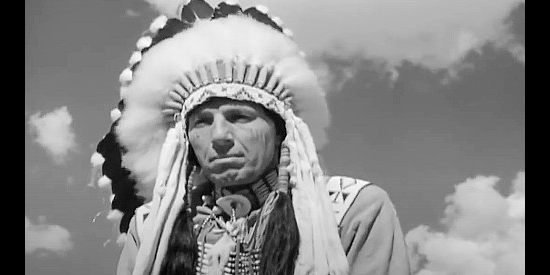 Iron Eyes Cody as Chief Yellowstone, leader of the Indians negotiating with the whites in Massacre River (1949)