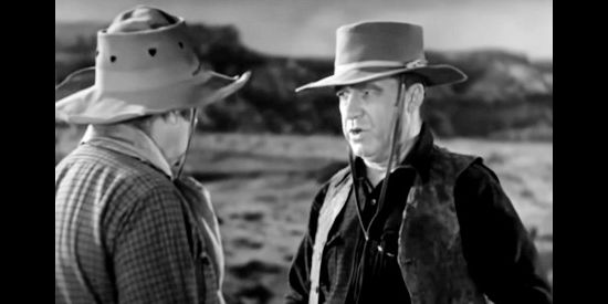 J. Farrell Mac Donald as Jeff Cameron, about to get into a years-long feud with his best friend over an infant found in the desert in The Painted Desert (1931)