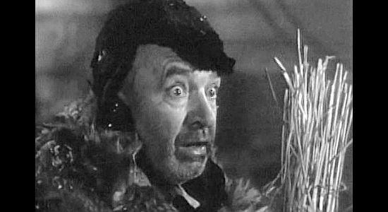 J. Farrell MacDonald as Pat O'Toole, helping Sgt. Conniston track down John Keith in River's End (1930)