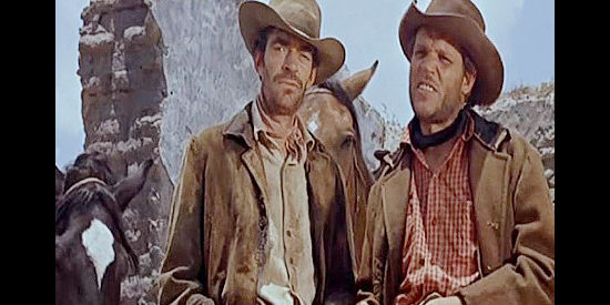 Jack Elam as Ed Hobbs and Neville Brand as his brother Frank, joining the cattle driver with not so honorable intentions in The Last Sunset (1961)