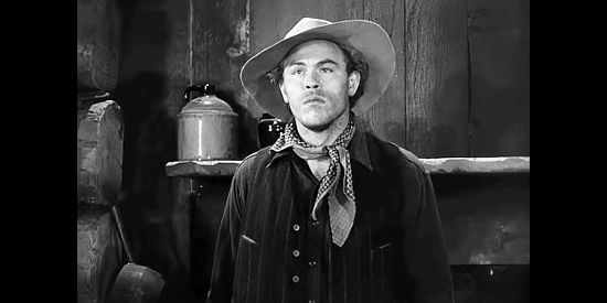 Jack Lambert as Jet Younger, hired gun for the lawless faction in Abilene Town (1946)