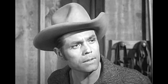 Jack Lord as Linc Bartlett, a man who tries to grant Kim Sung her freedom, then falls for her in Walk Like a Dragon (1960)