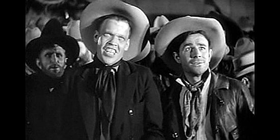 Jack Pennick as Pete and Buddy Roosevelt as Tex, two of the cowpokes Windy cheats in Way Out West (1930)