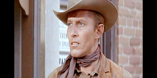 Jan Merlin as Nielson, the deputy tasked with keeping an eye on Gifford while he's undercover in Gunfight at Comanche Creek (1964)