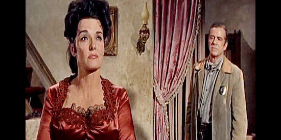 Jane Russell as Nona Williams talking about a sordid past with former beau Dana Andrews as Johnny Reno in Johnny Reno (1966)