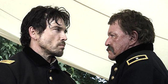 Jason Gedrick as Louis McIntire and Tom Berenger as Gen. McIntire in War Flowers (2012)