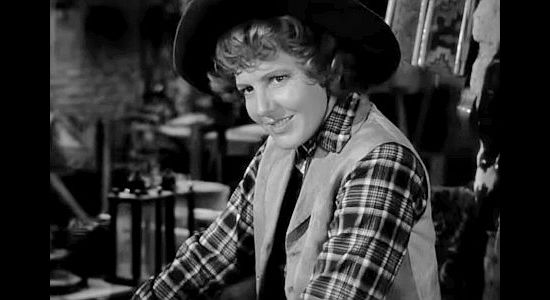 Jean Arthur as frontierswoman and pie maker Phoebe Titus, intrigued by newcomer Peter Muncie in Arizona (1940)