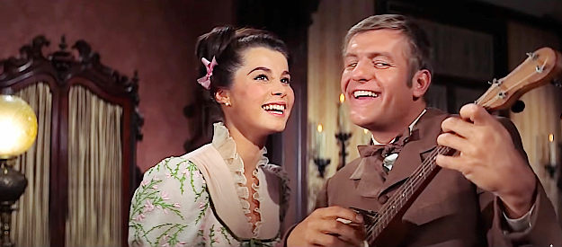 Jerry Van Dyke as Matt Douglas Jr., romancing Becky McLintock (Stefanie Powers) with a song in McLintock! (1963)