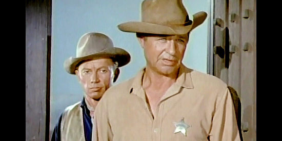 Jim Davis as Marshal MacPhee and Rayford Barnes as Lonny Curry, looking for Jesse in Jesse James Meets Frankenstein's Daughter (1966)