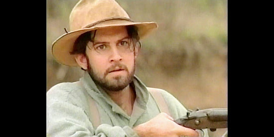 Jim Freivogel as Will Cross, trying to steer his brother clear of trouble in Defiance (2002)