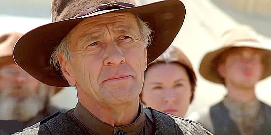 Jim Haynie as Elijah, leader of the homesteaders in Avenging Angel (2007)