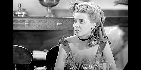 Joan Barton as Lila Neal, a saloon singer Quirt sometimes dreams about in Angel and the Badman (1947)
