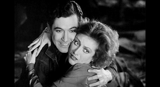 Joan Crawford as Joan 'Montana' Prescott, throwing herself into the arms of Larry Kerrigan (Johnny Mack Brown) after being frightened by a frog in Montana Moon (1930)
