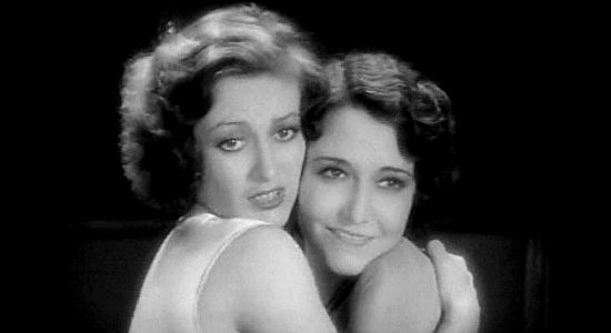 Joan Crawford as Joan 'Montana' Prescott, vowing not to steal another boyfriend from sister 'Lizzie' in Montana Moon (1930)