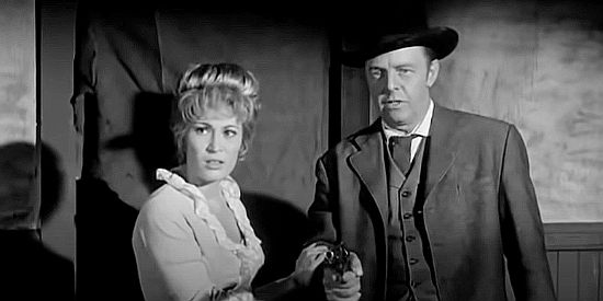 Jodi Mitchell as Sally Lattimore, trying to prevent Ben (Harry Lauter) from carrying out his planned vengeance in Convict Stage (1965)