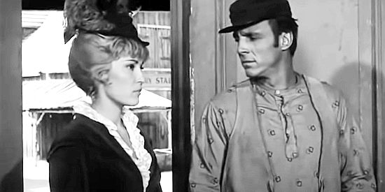 Jodi Mitchell as Sally and Michael Carr as Piute, entering the ghost town saloon where the stage passengers plan to take refuge in Convict Stage (1965)