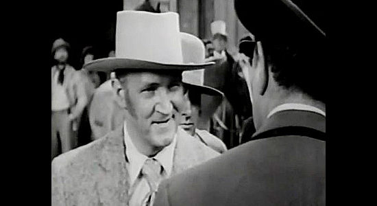 Joe Sawyer as Brannigan, rallying workers against Stephen Bent because their pay is overdue in Buckskin Frontier (1943)