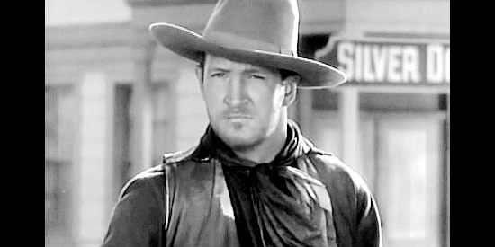 Joe Sawyer as Keeler, a Mannon henchman weighing the wisdom of a showdown with Clay Tallant in The Arizonian (1935)