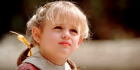 Joey King as Amelia, the young girl who finds a father figure in the Preacher in Avenging Angel (2007)