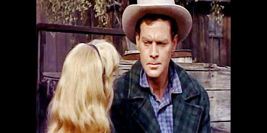 John Agar as Dan Carroughers, the stage driver who has fallen in love with Julie Parker in Stage to Thunder Rock (1964)