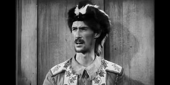John Carradine as Simon Girty, the renegade white who leads Indian raids in Daniel Boone (1936)