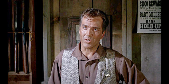John Crawford as Clay Dean, the lawman at Fort Concho who once owned the scalp that came off Jess Remsberg's dead wife in Duel at Diablo (1966)