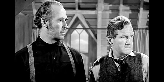 John Halloran as Thomas Worth and Tom Powers as Dr. Mangram discuss a wounded gunman in Angel and a Badman (1947)