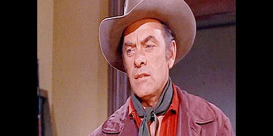 John Ireland as Dan Shelby, a deputy suspicious of the new ex-Rebel sheriff in Arizona Bushwhackers (1968)