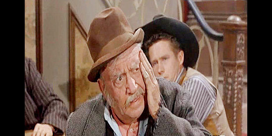 John Litel as Blaine Madden's drunk father, recognizing his son at the saloon in The Gun Hawk (1963)