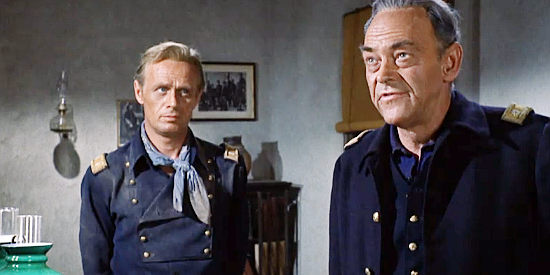 John McIntire as Maj. Frazier, trying to convince McCabe to accept the mission as Lt. Jim Gary (Richard Widmark) looks on in Two Rode Together (1961)