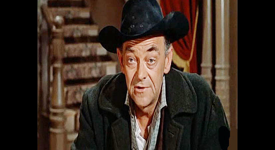 John McIntire as Sgt. Henessey, the veteran ranger who takes Seven under his wing in Seven Ways from Sundown (1960)