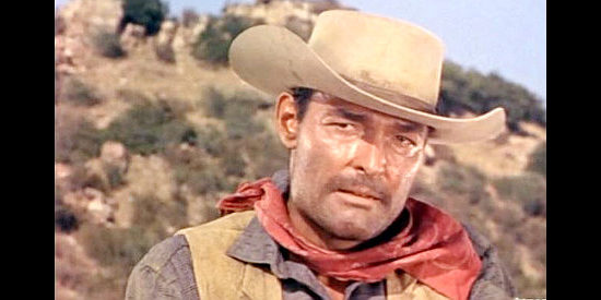 John Russell as Eli Jonas, a wagon train boss reluctant to tell his followers of the Indian trouble in Fort Utah (1967)