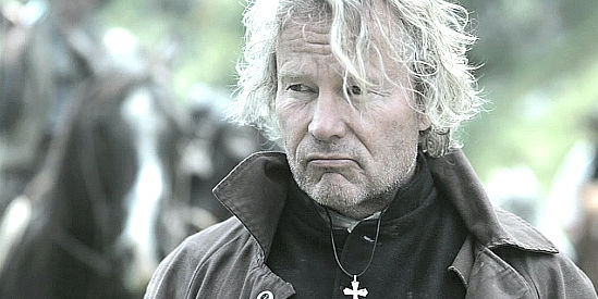 John Savage as Father Bill, notorious for stealing other people's gold finds in A Sierra Nevada Gunfight (2012)