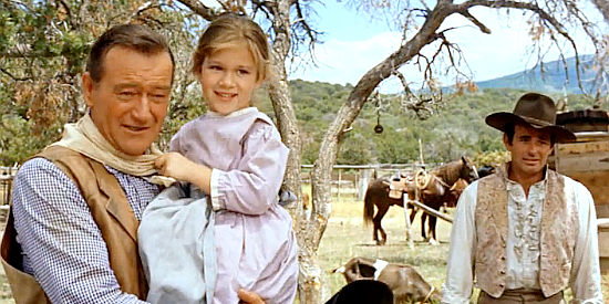 John Wayne as Capt. Jake Cutter, Aissa Wayne as Bessie Marshall and Stuart Whitman as Paul Regret in The Comancheros (1961)