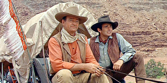 John Wayne as Capt. Jake Cutter and Stuart Whitman as Paul Regret, hoping to find the comancheros camp in The Comancheros (1961)