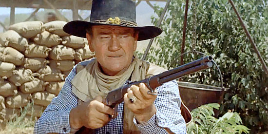 John Wayne as Capt. Jake Cutter, regretting not being able to take a shot at Paul Regret in The Comancheros (1961)