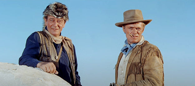 John Wayne as Davy Crockett and Richard Widmark as Sam Bowie, watching the Mexican Army assemble in The Alamo (1960)