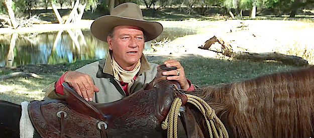 John Wayne as George Washington McLintock, discussing the settling of the West with his daughter in McLIntock! (1963)