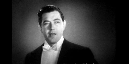 Johnny Mack Brown as Brooks Claybourne, the admirer who showers Ruby with diamonds  in Belle of the Nineties (1934)