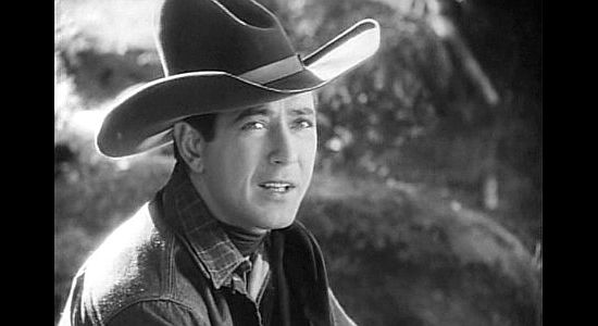 Johnny Mack Brown as Larry Kerrigan, admitting his infatuation with Joan Prescott in Montana Moon (1930)